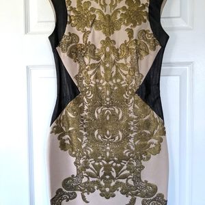 Gently used Lipsy mini dress with gold baroque design and US Size 6 UK size 10.